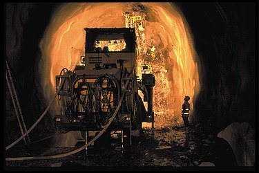 Image of tunnel construction with drilling jumbos