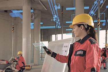 A female worker uses BIM - Building Information Modeling